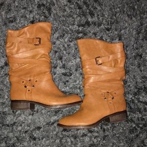 Brown leather boots with a wedge